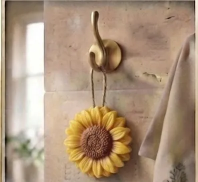 Sunflower Wall Hanging Soap — A handcrafted sunflower soap with a brass hook.